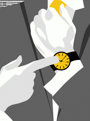 Ein Mann in einem Anzug zeigt auf seine Armbanduhr.
